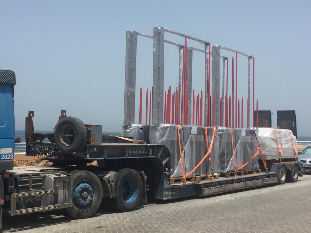 image of low bed trailer with heavy load