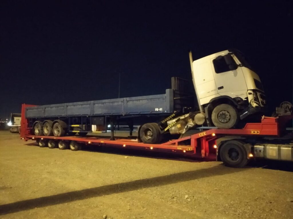 image of low bed trailers with heavy load